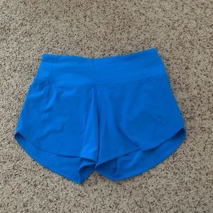 Lululemon Speed Up
Mid- Rise Lined
Short 4" Poolside in size 2